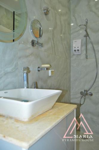 Maria Pyramids House