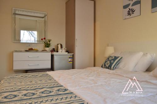 Maria Pyramids House