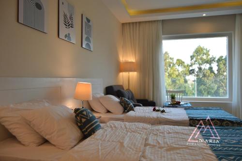 Maria Pyramids House