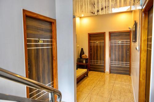 Közös társalgó / TV, Beedu Hostel in Gokulam