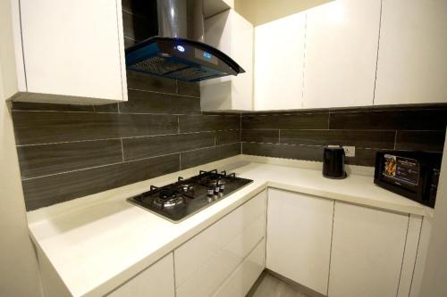 1-Bedroom Luxury Apartment - The Opus Luxury Residences by Book N Rent - image 7