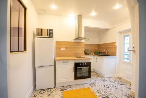 Mutfak, La Motte Bridard - 2 chambres - 1 canapé-lit - Parking - Jardin (La Motte Bridard - 2 chambres - 1 canape-lit - Parking - Jardin) in Auxerre
