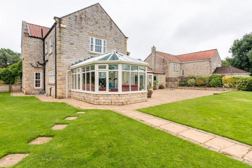 Viesnīcas āriene, Millfield Cottage in Normanbija