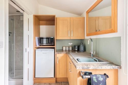 virtuve, Millfield Cottage in Normanbija
