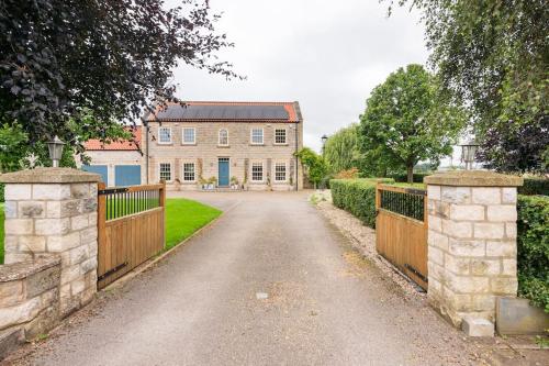 Viesnīcas āriene, Millfield Cottage in Normanbija