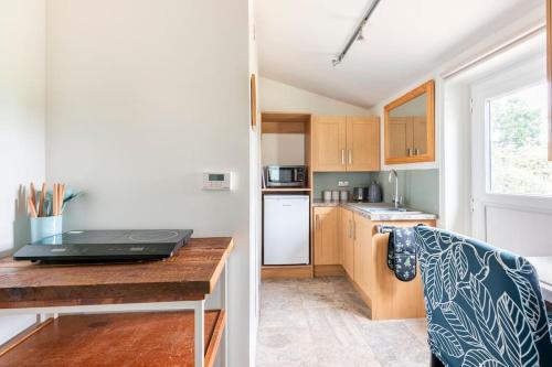 virtuve, Millfield Cottage in Normanbija