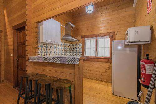 Közös társalgó / TV, Alojamiento rural Caserio de la Fuente in Deifontes