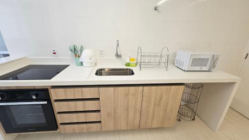 Kitchen, Lindo Apto - Completo - Praia Pitangueiras - near Subway