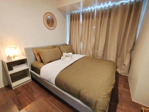 Air Residence 1BR Condo with City View, Manila