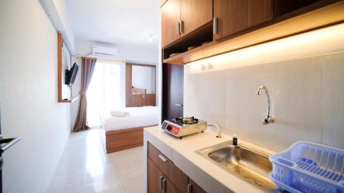 Simple and Comfortable Studio Apartment at Suncity Residence By Travelio - image 5