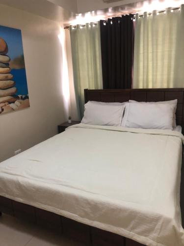 Holiday Suite One Bedroom Condo Unit, Tigbauan