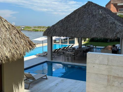 Departamento acogedor con vista al mar y alberca in Conchal, Mexico