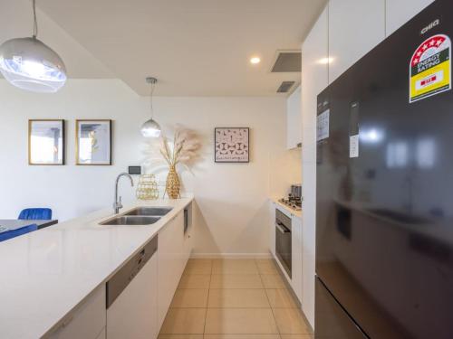 Modern 3BR Riverside APT w Parking near Shops and Park - Tap to explore photos