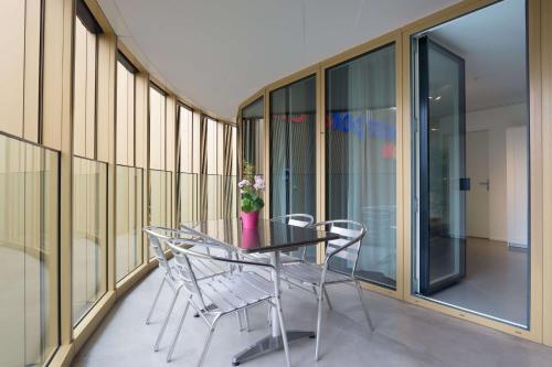 ระเบียง/ชานเรือน, ไฮเทรนตัล อัลล์เมนด์ คอมฟอร์ต อพาร์ตเมนต์ (HITrental Allmend Comfort Apartments) in เมสเซอ