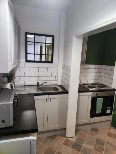 Konyha, The Old Bike Cabin Flat 1 in Heapey