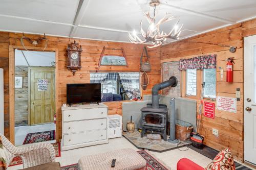 Waterfront Weare Cottage with Fire Pit and Kayaks - image 11