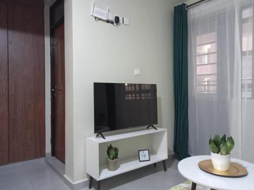 Cozy studio apartment with balcony in Ngong - Tap to explore photos