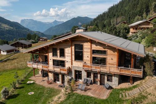 Magnifique chalet mitoyen - Jacuzzi - Cousinade II gîte à louer Les Contamines-Montjoie