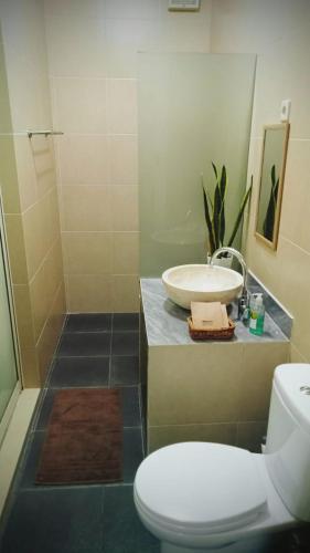 The Icon Homestay Malang - Tap to explore photos