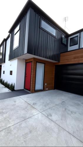 Exterior view, Close to City and Beach - Modern Home with Garage in Linwood