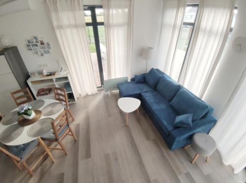 Ferienhaus Laura 70qm bis 5 Gäste mit Fass-Sauna, Whirlpool April bis Oktober, 75qm Terrasse und eingezäunten Garten Haustiere willkommen