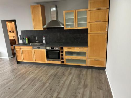 Gemütliche Ferienwohnung mit 1 Schlafzimmer, Wohnzimmer mit Schlafcouch & voll ausgestattete Küche in Rauschenberg, Deutschland