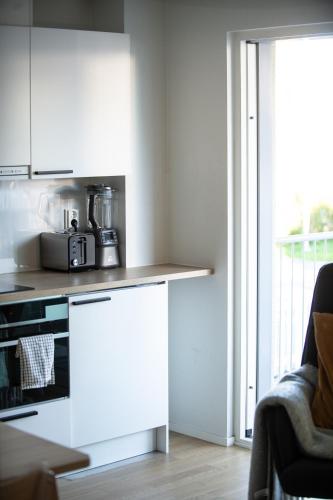 Cocina, Kokkola Charm - Central Apartment by University Center in Kokkola