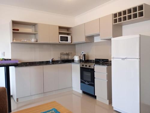 Samsara La Falda- Depto con con cochera cubierta-piscina -AC-calefaccion-SUM-vistas a las montanas-W in 拉法爾達