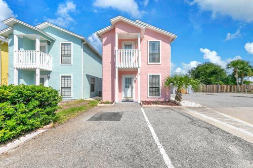 Sand Castles West T1- Pink House by Emerald Coast Retreats