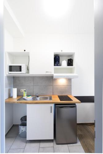 Kitchen, Berne Apartments in Rahlstedt