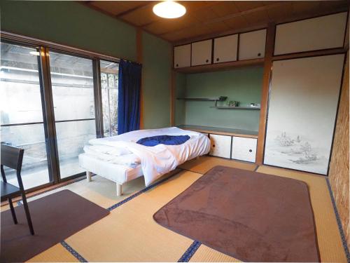 四国旅行のHUB拠点 古民家ゲストハウスheso house Room Type - Twin Room with Shared Bathroom