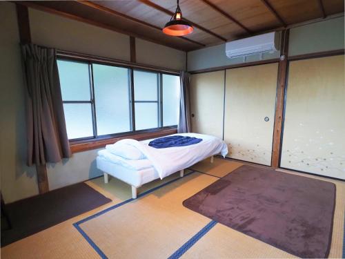 四国旅行のHUB拠点 古民家ゲストハウスheso house Room Type - Twin Room with Shared Bathroom