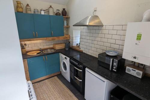 Rhyd Y Geifr, Cosy Barn Conversion in Maerdy in Llangwm (Conwy)