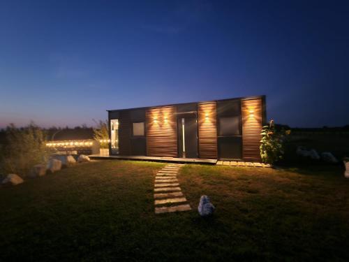 Exterior view, GRETA Nowoczesny domek modulowy nad stawem in Osjakow