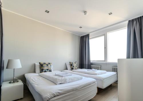 Four-Bedroom Apartment room in Máni Apartments by Heimaleiga