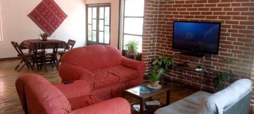 Delt lounge/TV-område, La Otra Casita Feliz in Cochabamba