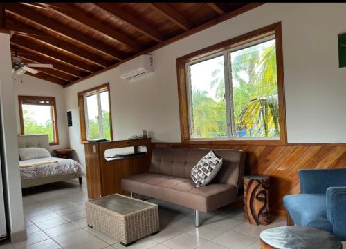 Dove Escapes - One bedroom beach front upper Cabana in Caribbean Way