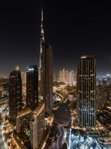 Skyline Serenity Holiday Home I Burj Khalifa Bliss I 4 bedroom Apartments I Burj Khalifa & Fountain Views I Free Gym Pool Parking and WIFI - image 13