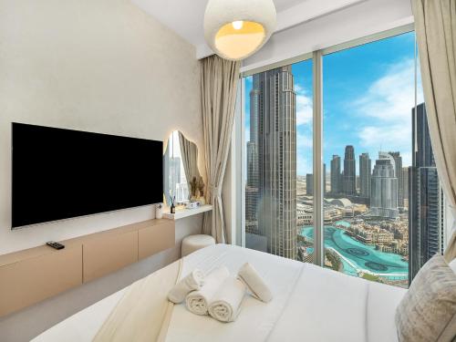 Skyline Serenity Holiday Home I Burj Khalifa Bliss I 4 bedroom Apartments I Burj Khalifa & Fountain Views I Free Gym Pool Parking and WIFI - image 9
