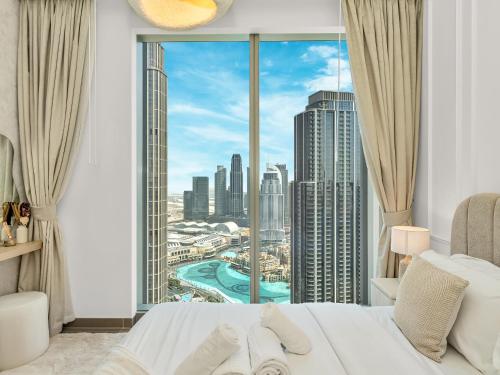 Skyline Serenity Holiday Home I Burj Khalifa Bliss I 4 bedroom Apartments I Burj Khalifa & Fountain Views I Free Gym, Pool, Parking and WIFI, Dubai