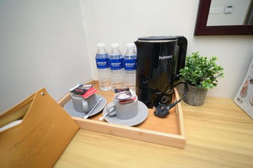 Swiss Cottage Hotel Room Type - Deluxe Triple Room