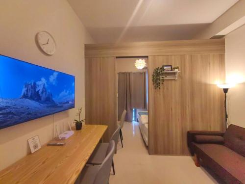 1BR Condotel with Balcony at FAME Residences #FM37, Manila