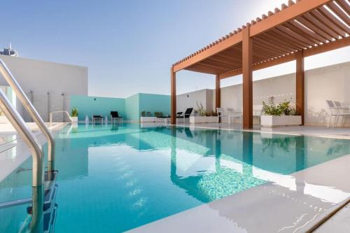 Waves - Refined Studio with Balcony & City Views in Luma21, Dubai