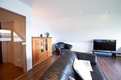 Recreational facilities, Ferienwohnung am See mit Balkon & Seeblick nahe Lubeck & Ostsee in Hamberge