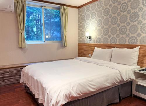 Foto - 泊居旅店 Oursinn Hotel