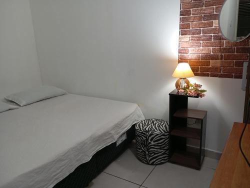 Suíte Casa Central Garagem Hatch