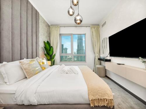 Luxe 4 bedroom Apartment I Burj Khalifa & Fountain Views I Free Gym, Pool, Parking, Wi-Fi and PS5 I by Skyline Serenity, Dubái (foto 2)