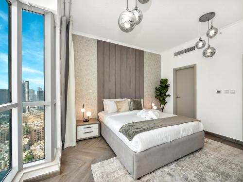 Skyline Serenity Holiday Home I Luxe 4 bedroom Apartment I Burj Khalifa & Fountain Views I Free Gym Pool Parking Wi-Fi and PS5 - image 12