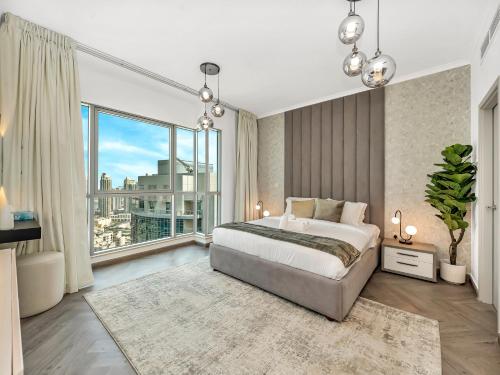 Skyline Serenity Holiday Home I Luxe 4 bedroom Apartment I Burj Khalifa & Fountain Views I Free Gym Pool Parking Wi-Fi and PS5 - image 6