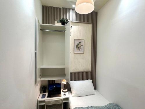 Cozy Partition Room for Travelers in Tecom, Dubaj (fotografie 2)